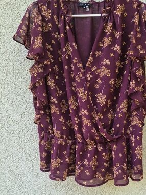 1. State Plum Floral Ruffle Wrap Top with Gold Accents